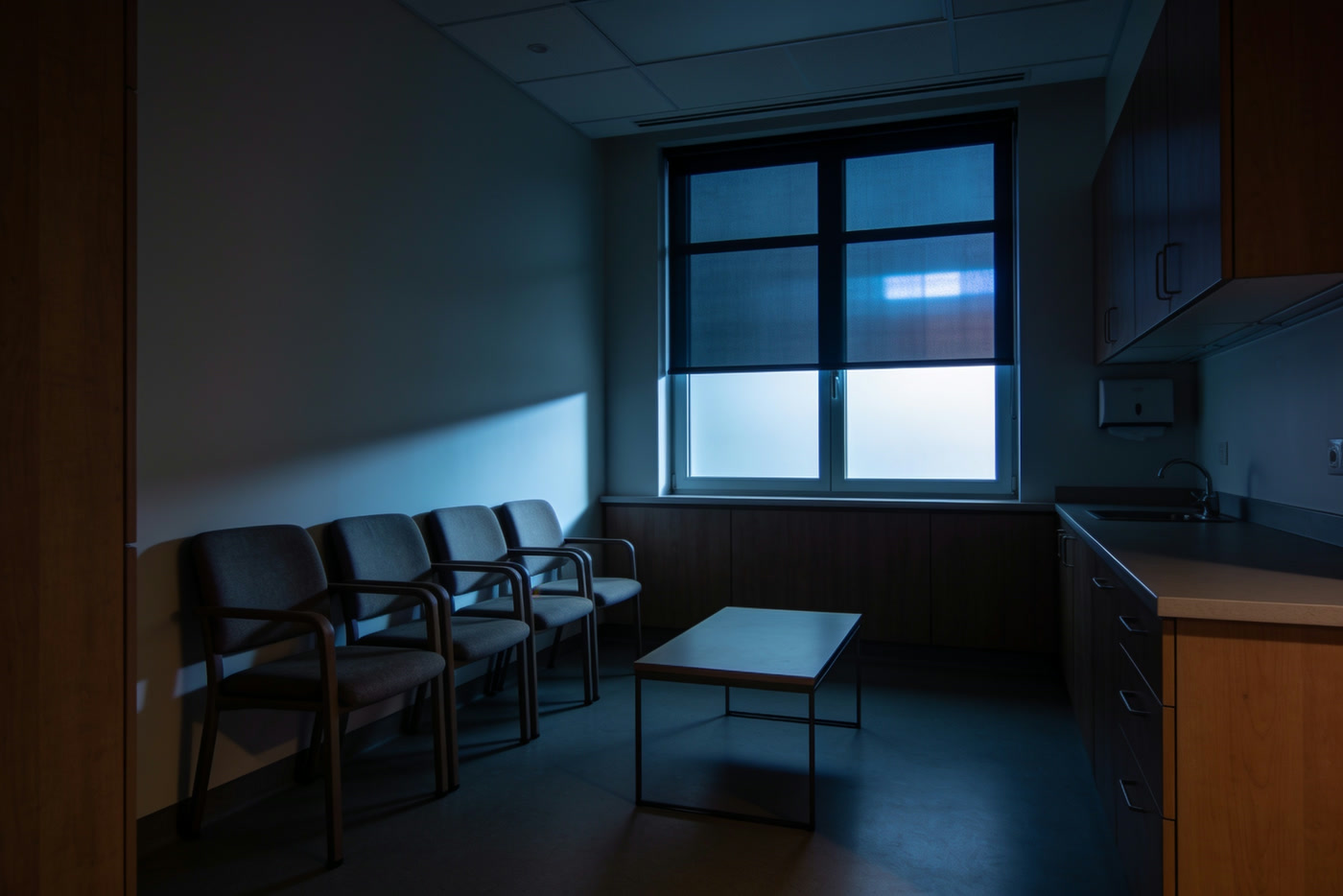 An empty waiting area in dim light before opening